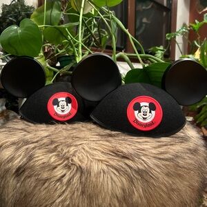 Disneyland Mickey Mouse Ears Hat for a pair of hats. Like new.